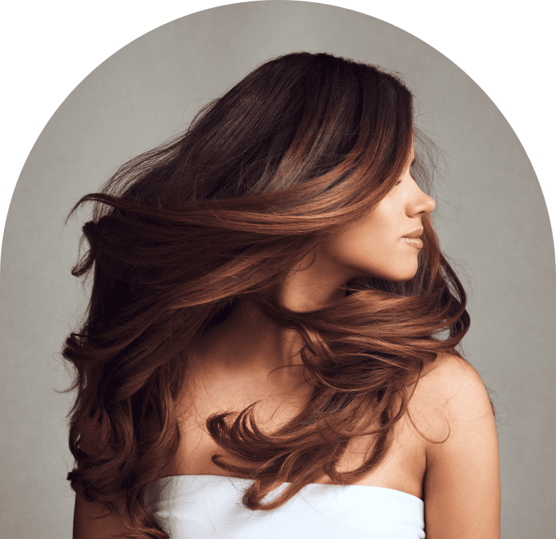 Woman with long, flowing brown hair.
